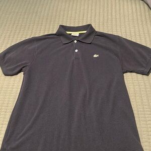 Lacoste navy polo.